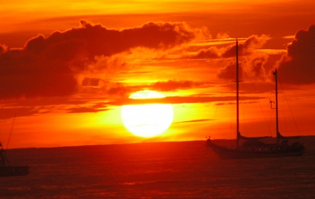 Red Sunset at Tamarindo Beach - summer, boat, beach, ocean, nature, sunset, red, ship, tamarindo beach, sun, costa rica, skyphoenixx1, coast, clouds, orange, sea, sunrise, waves, sunshine