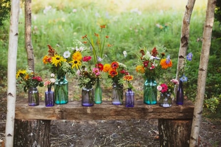 Spring is here! - vases, flower arrangements, spring, wood, nature, table, seasons, flowers, garden, outdoor