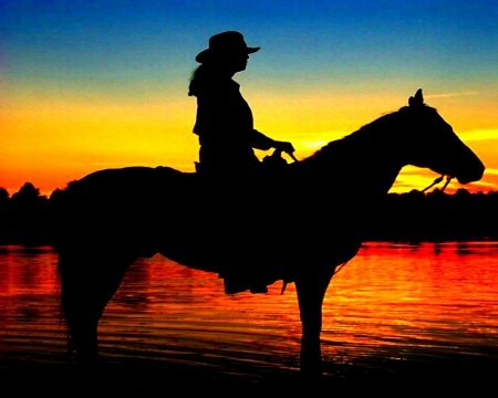 Cowgirl Sunset - horse, water, silhouette, shadow, lake, sky, cowgirl, silhouettes, hat, trees, sunset