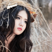 Cute brunette with nest on her head