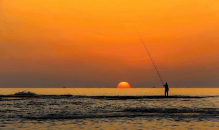 Fishing at the sunset - fishing, sea, man, sun