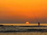 Fishing at the sunset