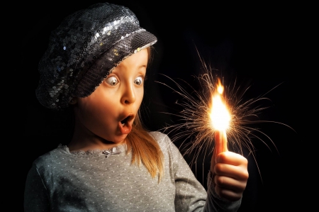 A small girl - sparklers - A small girl, eyes, big, sparklers