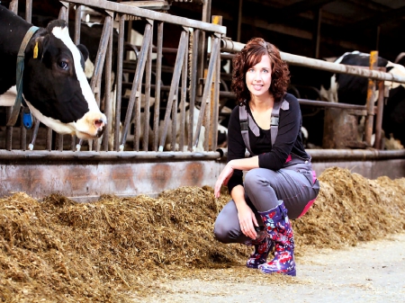 Feedin' The Heard - women, fun, female, boots, fashion, models, brunettes, western, cows, girls, cowgirls, style, barn, hay, ranch