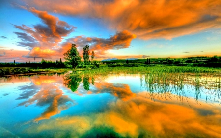 CLOUDS REFLECTING in the LAKE - clouds, water, lovely sunset, beautiful, evening, splendor, landscape, nature, reflecting, lake, enchanting nature, sky