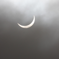 Solar eclipse through cloud