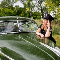 Police Woman and Old Buick