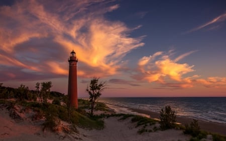 Lighthouse on Lake Michigan at Sunset - clouds, nature, beaches, lighthouses, sunsets, architecture, lakes, sky