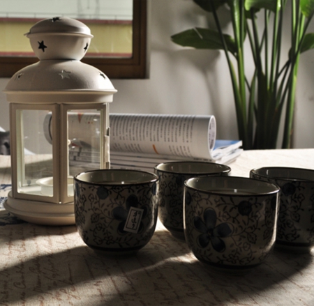 Still life - coffee table, cups, decoration, candle, interior, lantern, living room