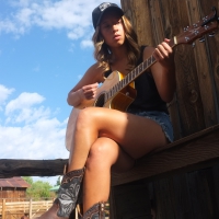 Guitar Picking Cowgirl