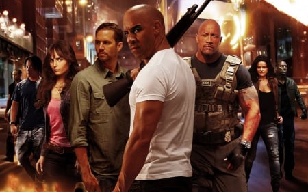 Furious 7 (2015) - vin diesel, gun, dwayne johnson, actress, movie, jordana brewster, furious 7, michelle rodriguez, man, actor, action, paul walker