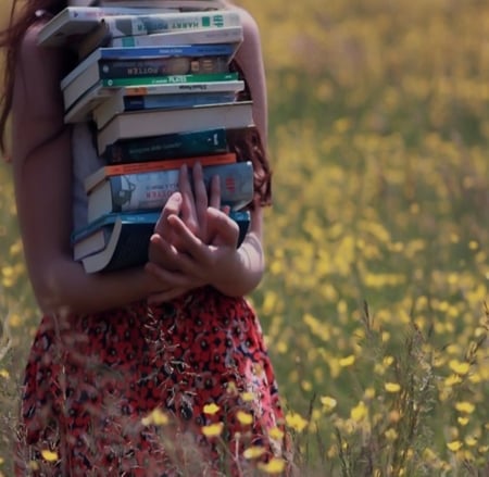 Girl carrying books - girl, carrying, books, summer, field, flowers, time