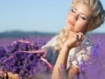 Beautiful blonde with a basket of lavender flowers