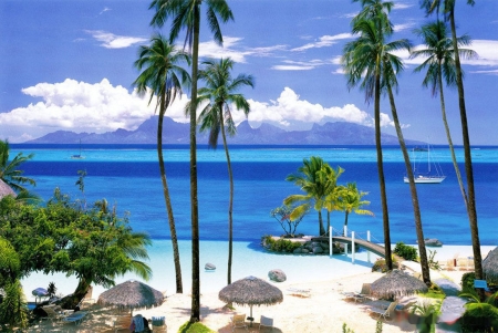 Exotic Beach - mountains, clouds, palms, sea, sailboat, umbrellas