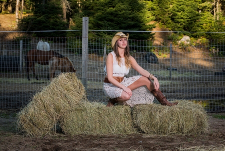 Fenced In - girls, women, style, fun, models, fence, hay, female, fashion, cowgirls, boots, hats, brunettes, western, ranch