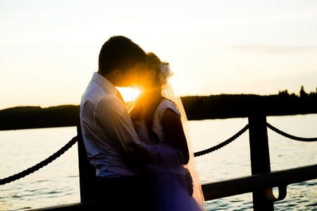 Beauty in a Kiss - sunset, together, lake, kiss, hug, love, bridge