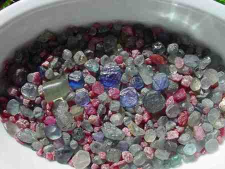 UNCUT SAPPHIRES AND RUBIES