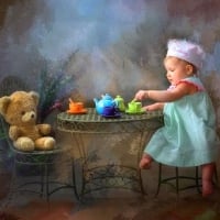 Little Girl Gives to Drink Tea Bear