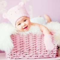 newborn baby girl in pink