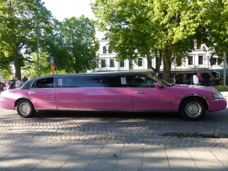 pink Limousine - limo, street, trees, sweden, town, car, pink, buildings