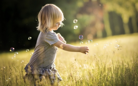 Catching bubbles - girl, child, summer, field, copil, bubbles, blonde, little