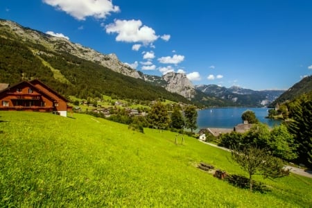 Mountain rest - greenery, summer, vacation, beautiful, slope, grass, rest, mountain, village, lake, chalet, houses, sky