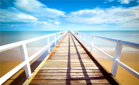 Blue Ocean Pier - beach, sky, sunshine, sun, water, coast, vacation, clouds, ocean, skyphoenixx1, summer, shore, waves, nature, holidays, pier, sea