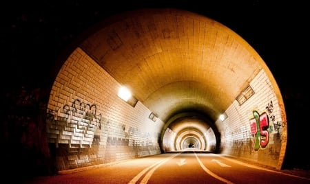 Graffiti on the walls of the tunnel - graffiti, tunnel, road, light