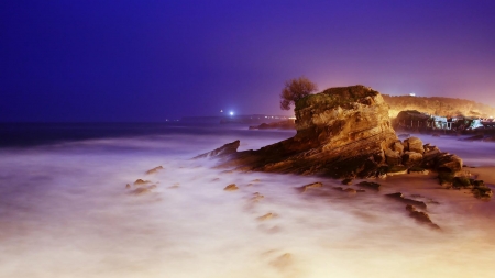 back llit seashore at night hdr - shore, foam, lights, sea, night, rocks