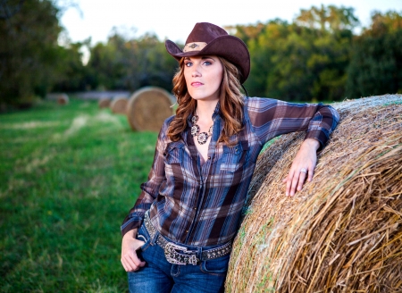 Cowgirl Holly - style, girls, western, women, hay bails, models, hats, ranch, cowgirls, horses, fun, female, fashion