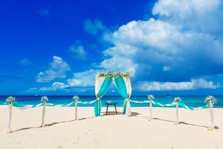 Beach Wedding - wedding, beach, sky, ocean, waves, clouds, decorations, table, flowers, sand, boat