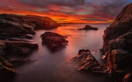 Burning Sky - sky, mountains, rocks, reflection, clouds, sunset, sea, nature