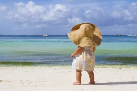 Sweet Beach Baby - hat, clouds, sun dress, beach, girl, ocean, sand, sweet, child, boats, darling, adorable, sky