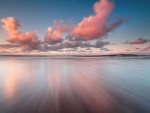 gorgeous pink clouds over sea