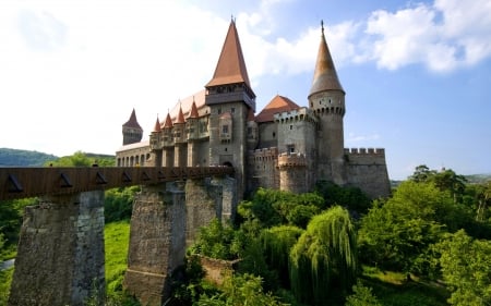 wondrous corvin castle in transylvania - towers, trees, castle, bridge