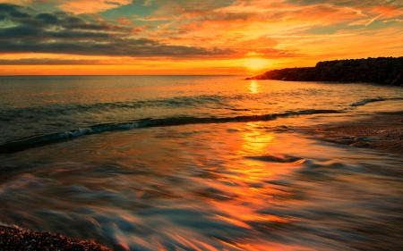 coming tide at sunset in tyrrhenian sea