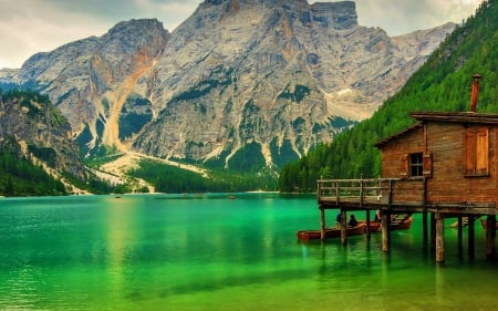 green lake in china - cabin, green, lake, forest, mountains, stilts