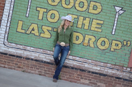 Miss Rodeo USA 2014~Elisa Swenson - hat, sign, elisa swenson, cowgirl, bricks, boots, belt, wall, miss rodeo, blonde