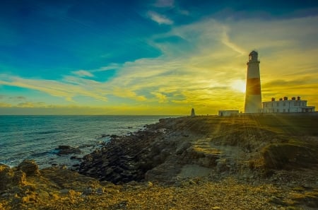 Lighthouse at Sunset - clouds, nature, lighthouse, beach, ocean