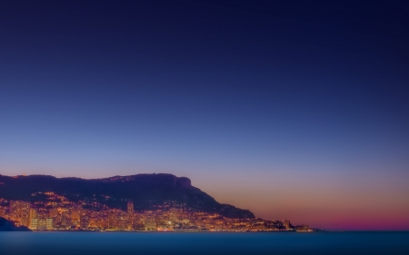 monaco in the distance at sunset - city, sunset, mountain, sea