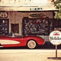 classic corvette in a garage on route 66