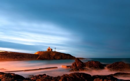 little chapel on an outcrop at the seashore - rocks, chapel, sunset, sea, mist, shore