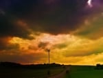 storm clouds over turbine windmill