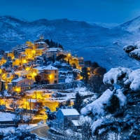 beautiful hillside village in winter hdr