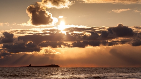 sunset over an island offshore - clouds, island, sunset, shore, sea