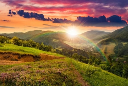 Rainbow over mountain - rays, slope, sky, rainbow, mountain, hills, sun, glow, amazing, fiery, beautiful, grass, wildflowers