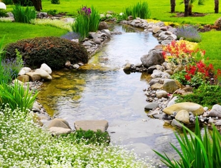 Park Creek - water, creek, stones, flowers, bush, Spring, plants, foliage, park, rocks