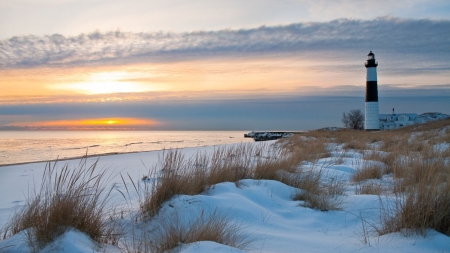 wonderful lighthouse on a winter beach at sunset - beach, lighthouse, winter, sunset, sea, grass