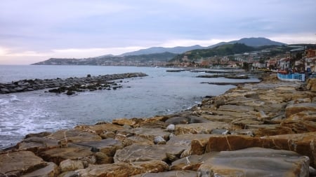 rocky shore in santo stefano italy - town, beach, sea, breaker, rocks