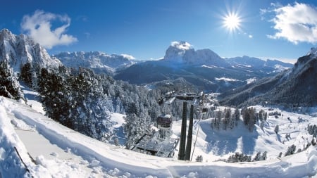 gorgeous clear day over ski resort in selva italy - lift, ski, trees, clear, sunshine, resort, mountains